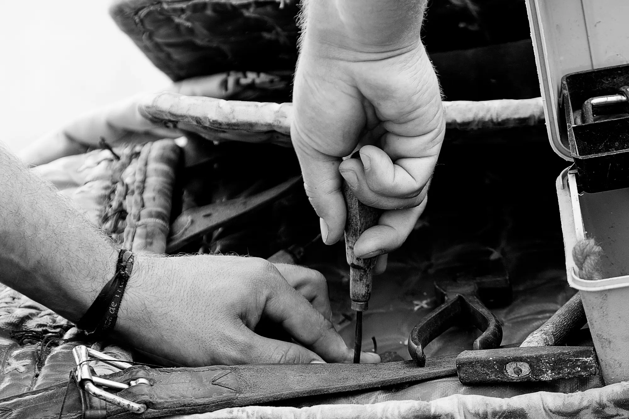 Hands using hand tools