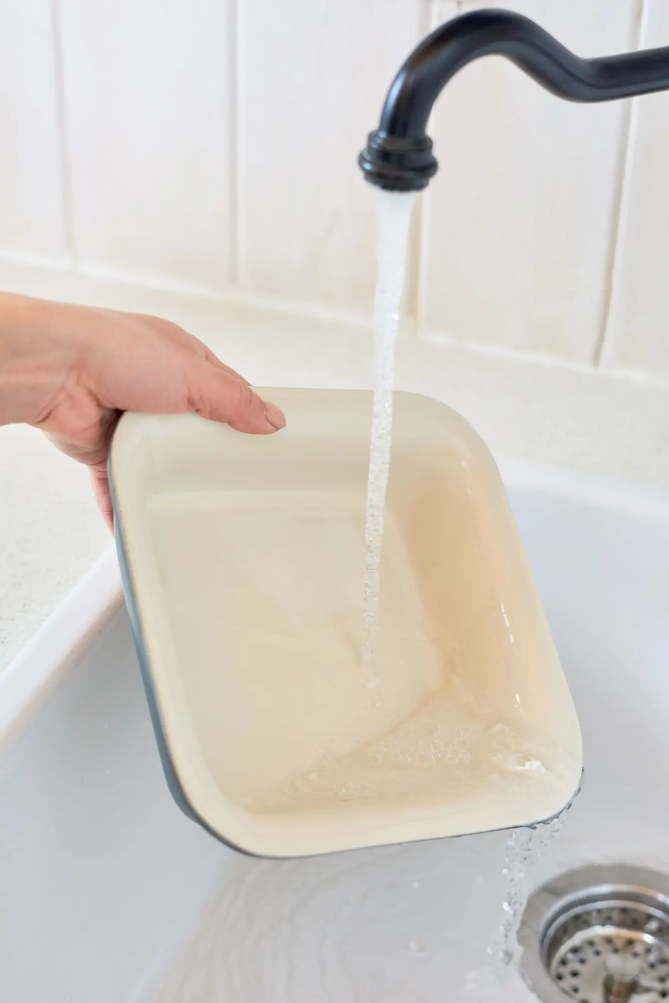 Filling a container at a tap